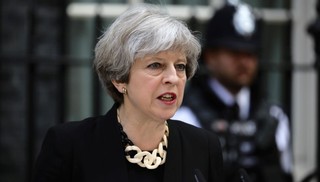 Britain's Prime Minister Theresa May speaks outside 10 Downing Street after an attack on London Bridge and Borough Market left 7 people dead and dozens injured in London
